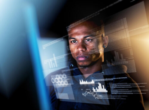 A professional analyzing digital data overlays on a transparent screen, illustrating the challenge of managing fragmented information for accurate verification.